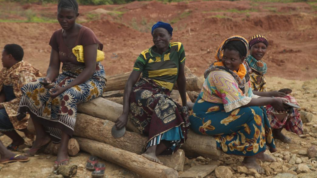 Artisanal small-scale female miners sitting in Tanzania