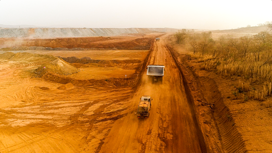 Trucks driving on the road near the mine in Senegal