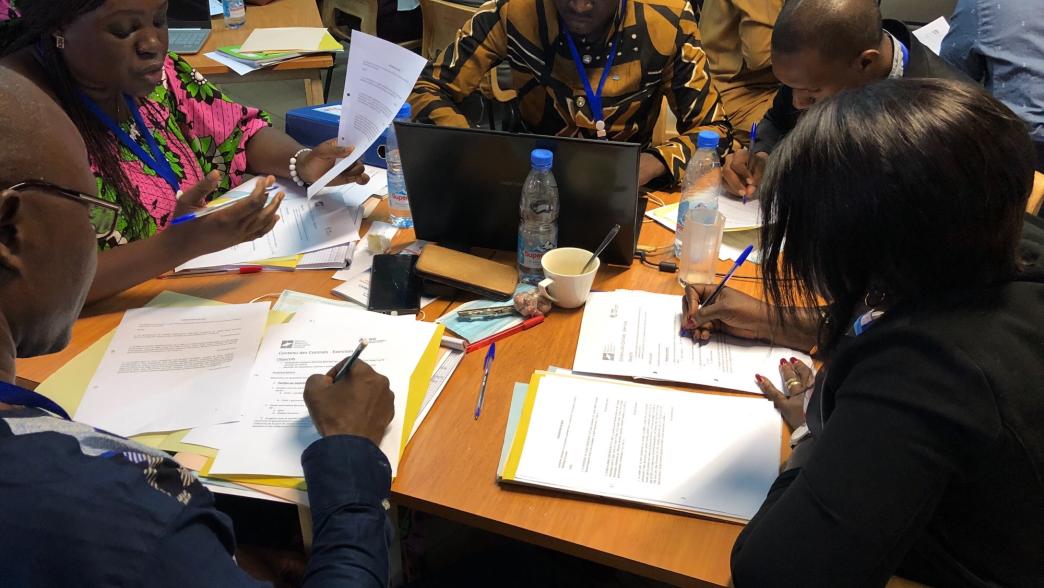 Participants in the Francophone Africa 2022 summer school studying at the table