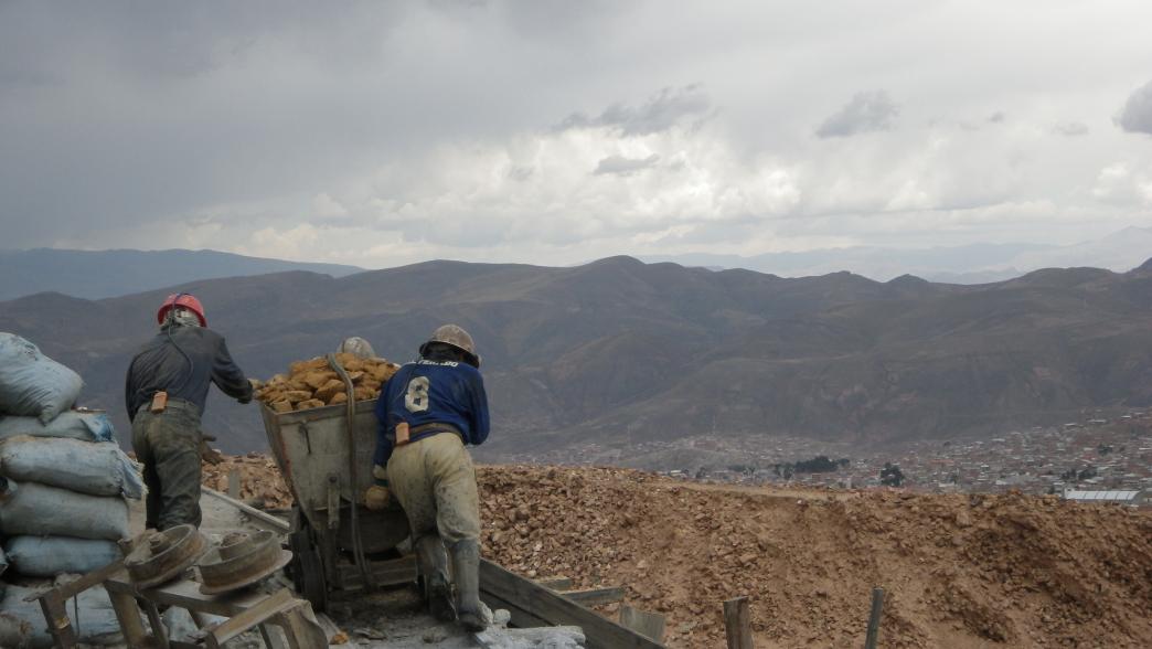 Miners pushing the cart in Potosi, Bolivia