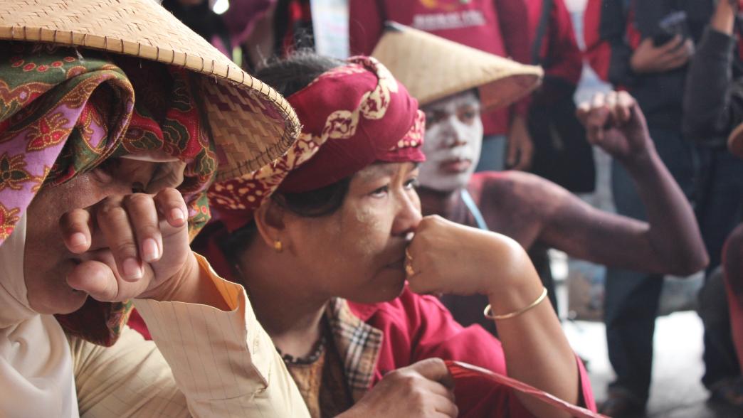 Indigenous community members hold a protest against government policies regarding their customary forest land