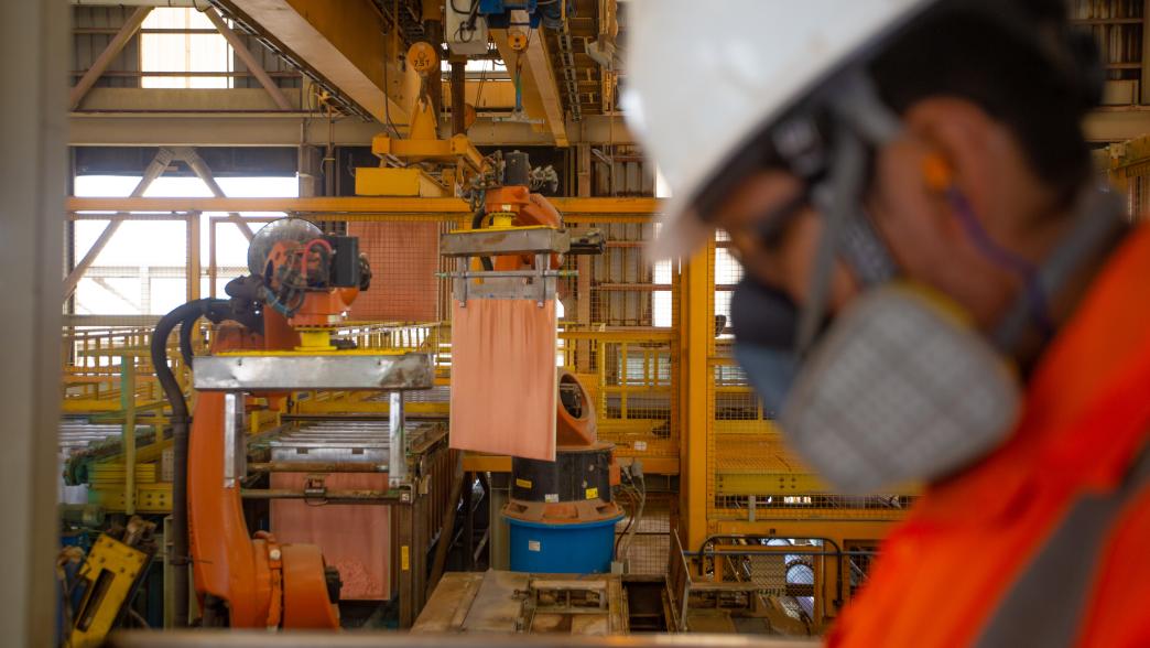 Robotic arms remove copper cathodes at a Copper Mine in Southern Peru.