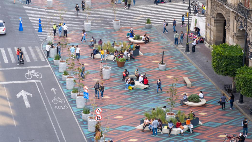 edestrians Sitting on Benches and Walking Near Zocalo Square in Mexico City