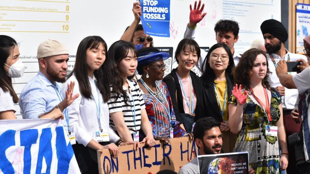 Young people protesting at COP