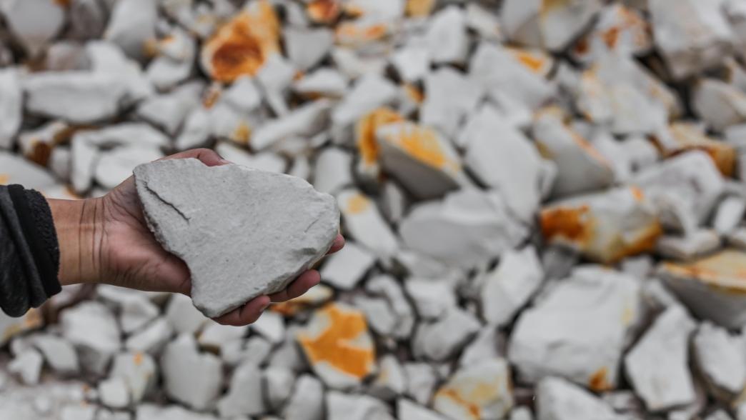 Man holding lithium in his hand