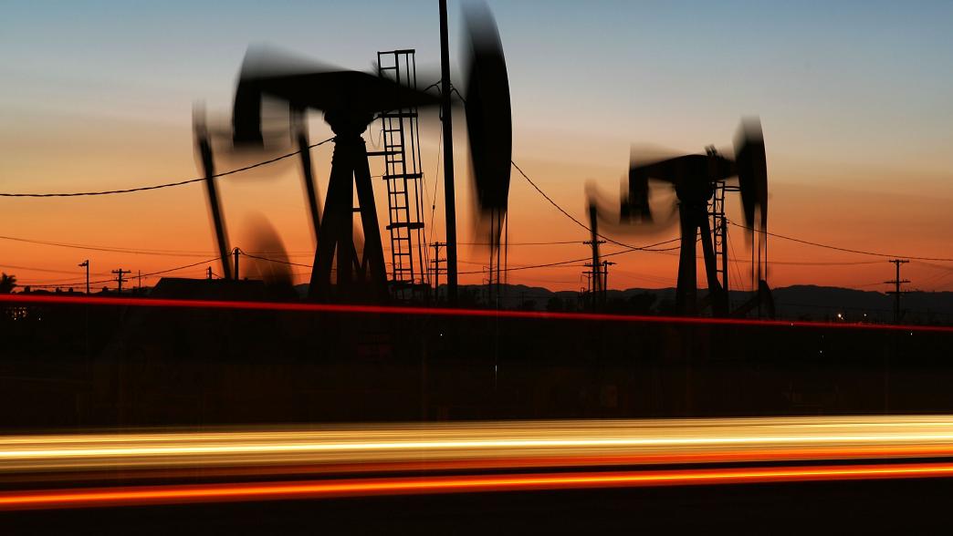 Oil rigs at sunset