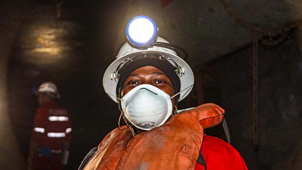 Woman in mining helmet