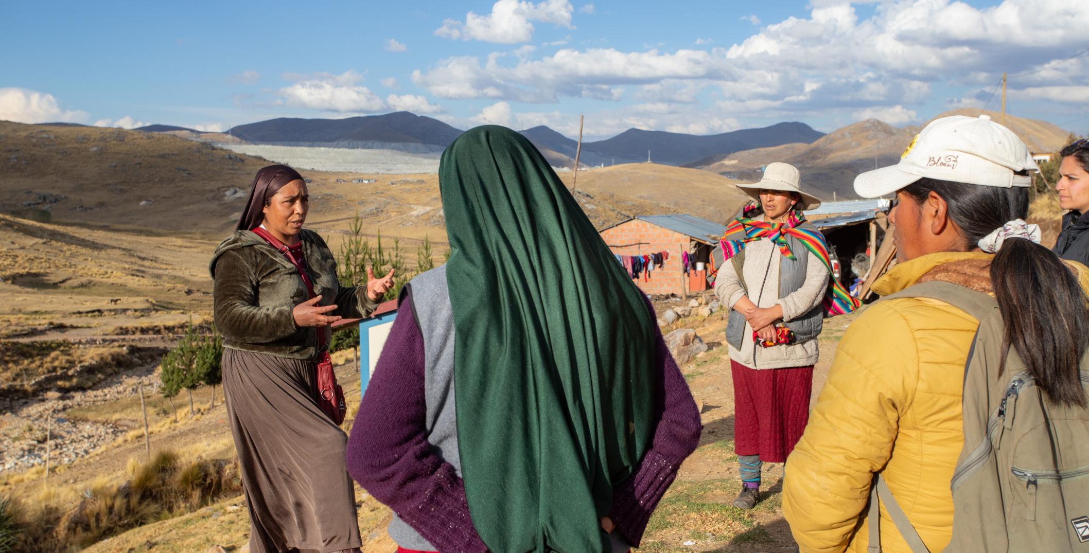 Community discussion near copper mine in Challhuahuacho, Peru