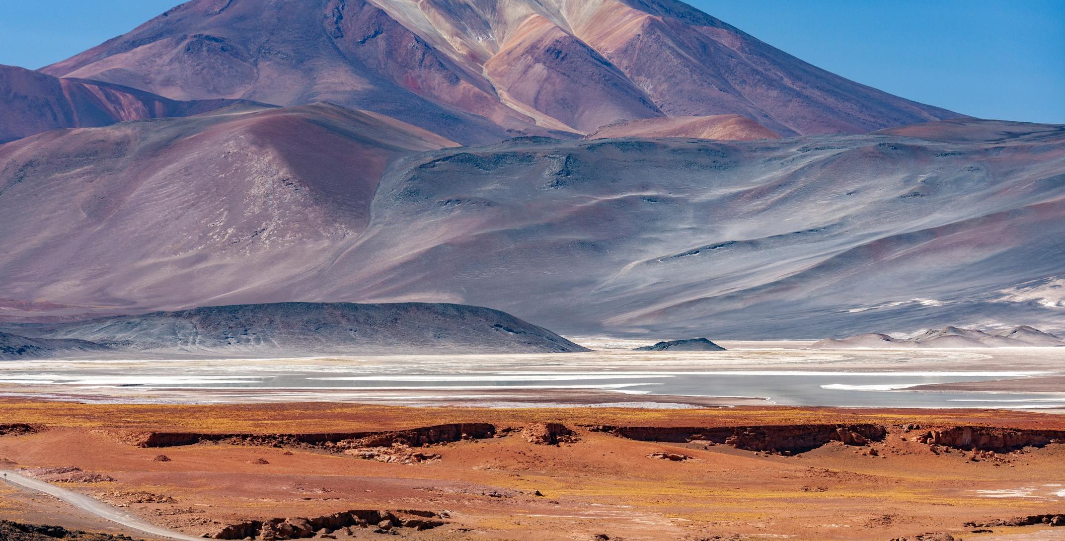 Alues Calientes salt flats near mountains in the Atacama Desert, Chile