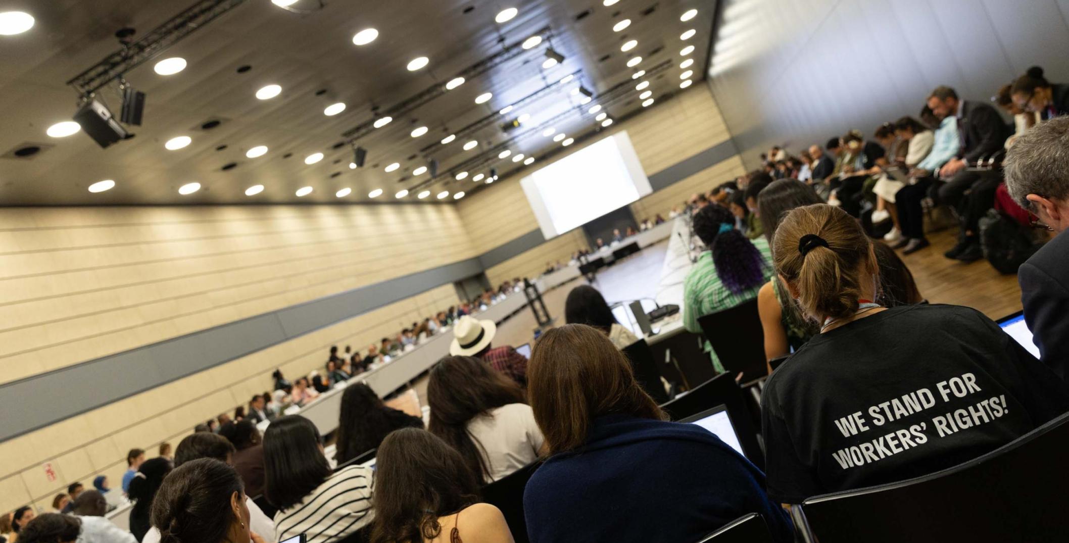 Lots of people attending a meeting at the Bonn Climate Conference