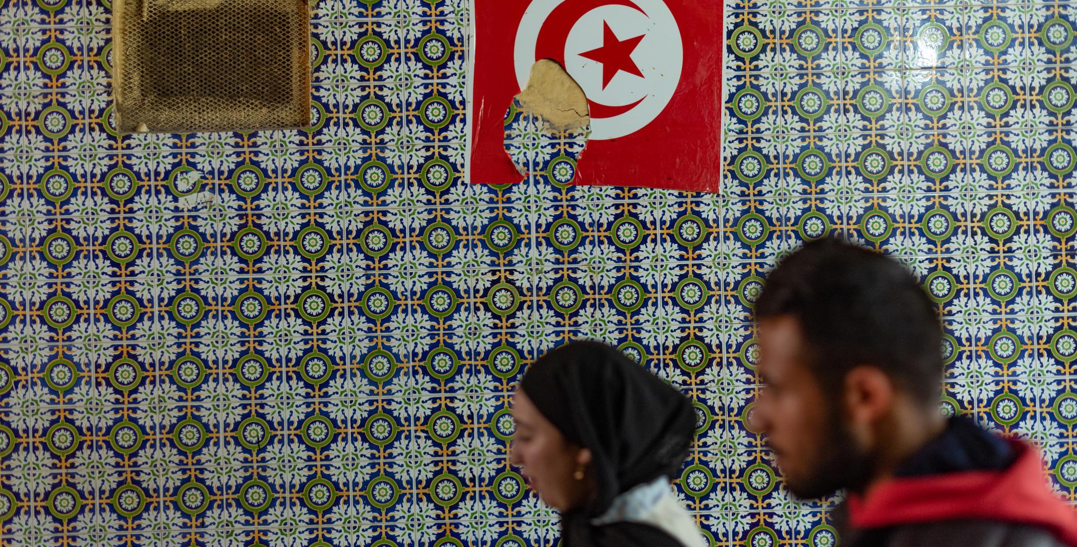 unisian decorated wall of a restaurant with a Tunisian flag in the World Heritage designated Medina of Tunis, Tunisia, North Africa.
