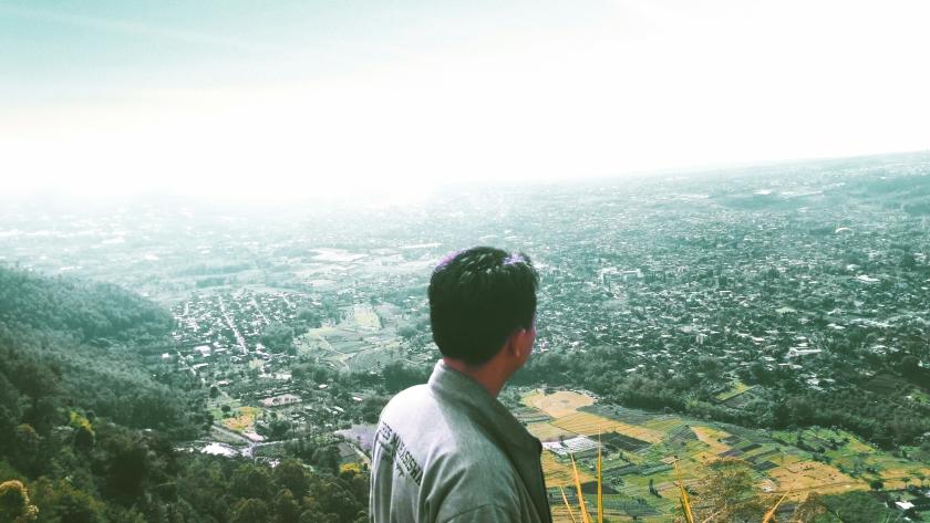 Man looking over Jakarta, Indonesia