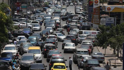 Traffic jam of vehicles queued up to refuel from a petrol station in Beirut
