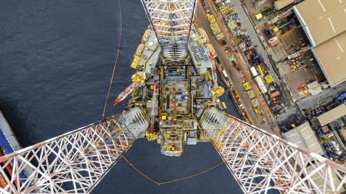 Offshore rig is under construction in shipyard by the sea