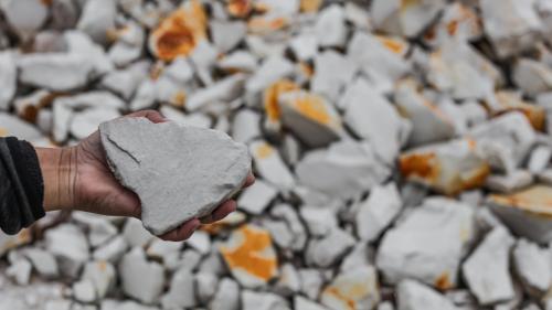 Man holding lithium in his hand