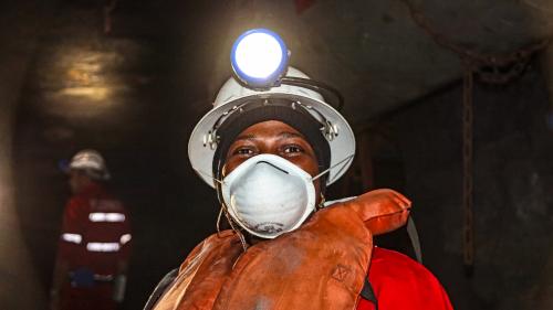 Woman in mining helmet