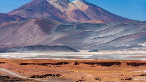 Alues Calientes salt flats near mountains in the Atacama Desert, Chile