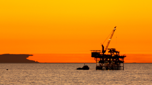 Oil rig against the sunset