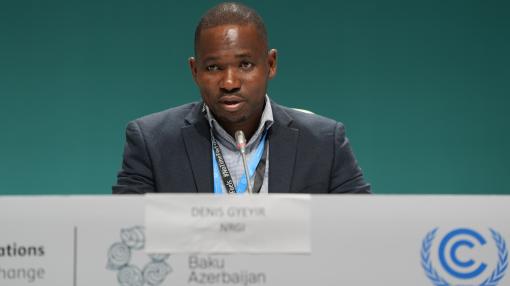 Denis speaking at COP29 press briefing