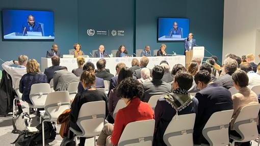 NRGI's Denis Gyeyir speaks at a COP29 press conference