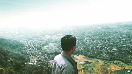 Man looking over Jakarta, Indonesia