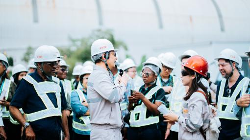Group of colleagues meeting on mining site