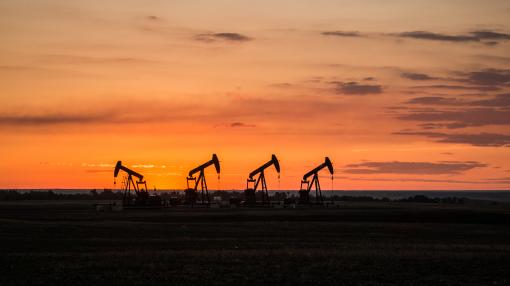 Oil rigs at sunset