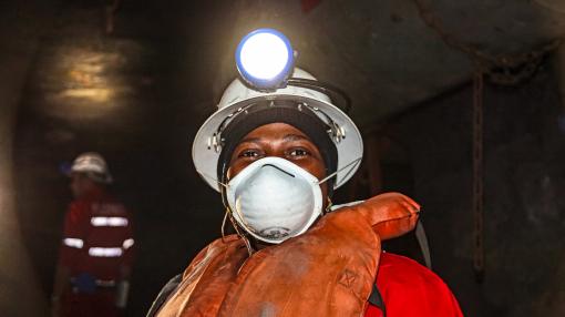 Woman in mining helmet
