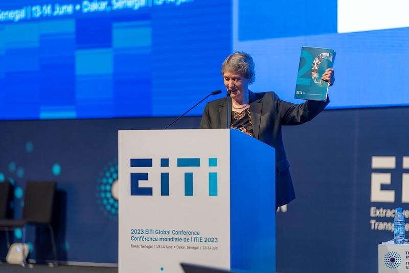 Helen Clark holds up the newly launched 2023 EITI Standard